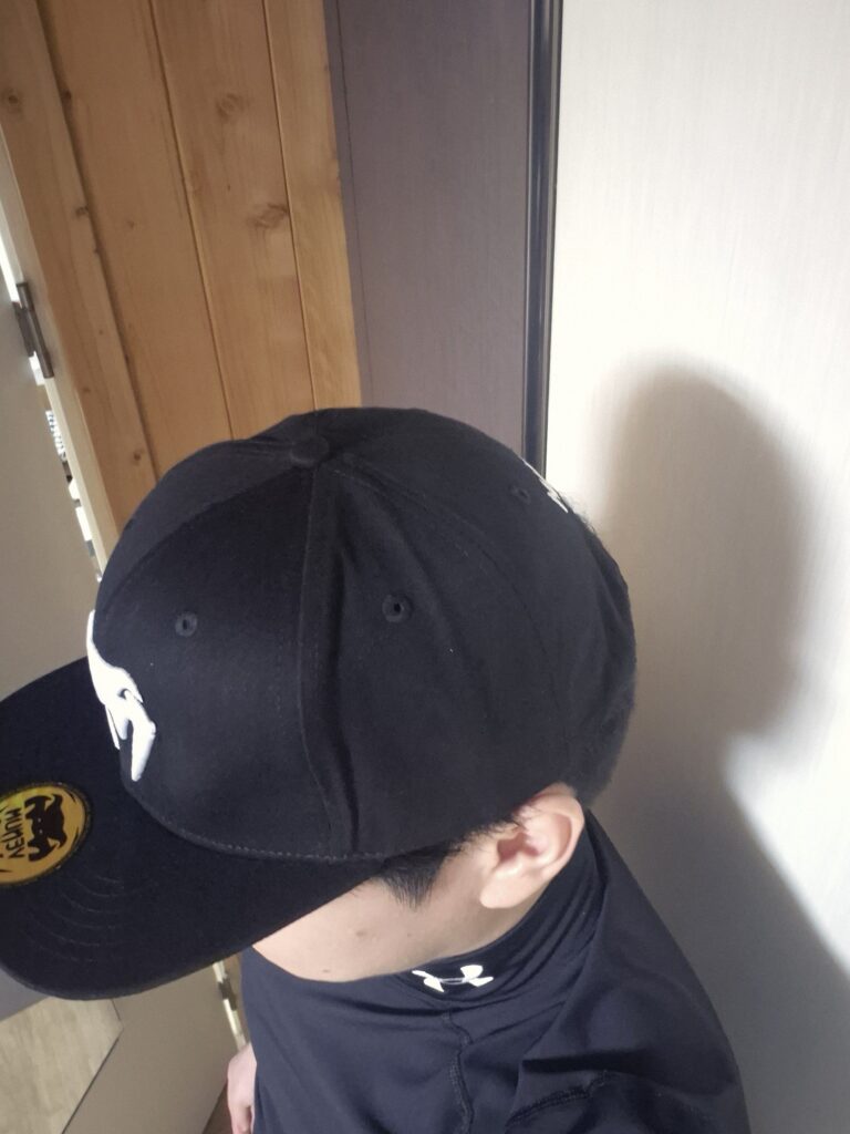 Pictured wearing the Venom Classic Snapback.